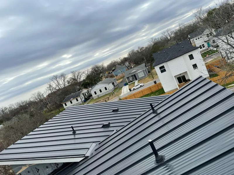 Standing seam metal roof panels with vents for Skylight Repair in Standish